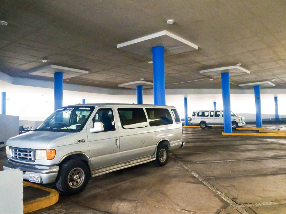 Two vehicles parked inside the Rio Piedras Terminal