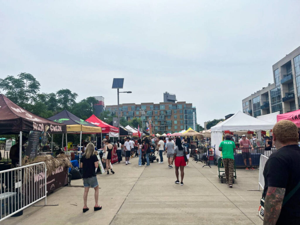 The crowd wandering around the food stalls in Smorgasburg