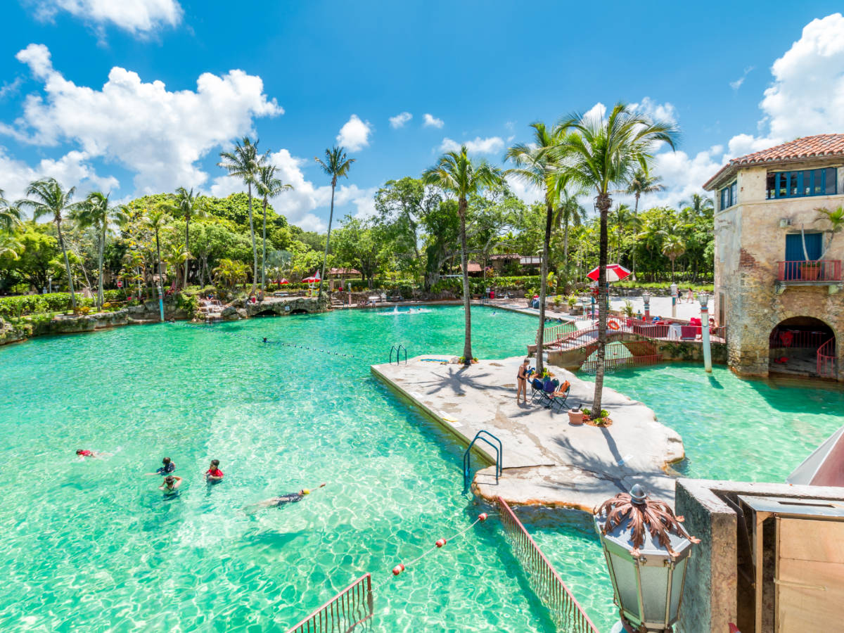 People enjoying their day at the Venetian Pool in Coral Gables