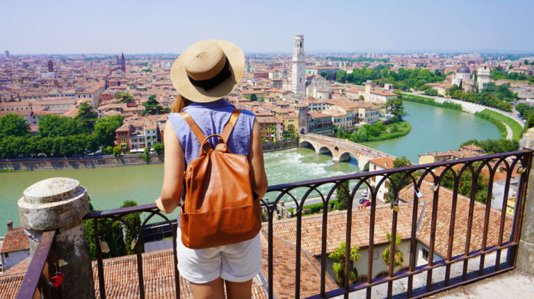 View of a traveler admiring Verona City in Italy