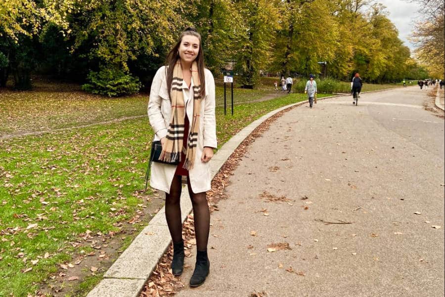 The author Brooke Horrobin posing on the road of Victoria Park during the autumn season