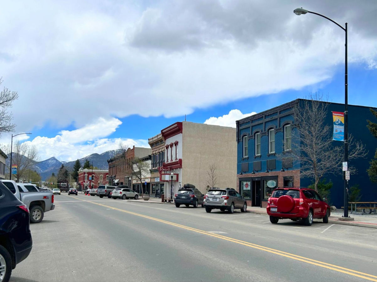 Victorian-era buildings in downtown Buena Vista with cars parked on both sides of the main street
