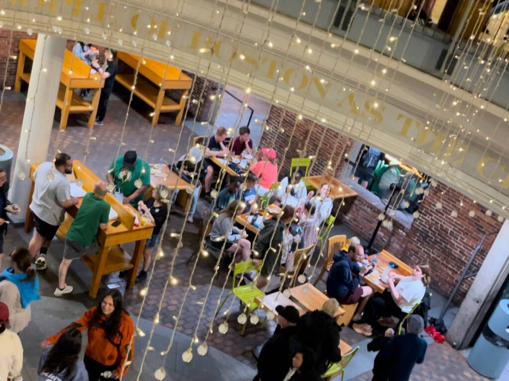 People dining on the Quincy Market food hall