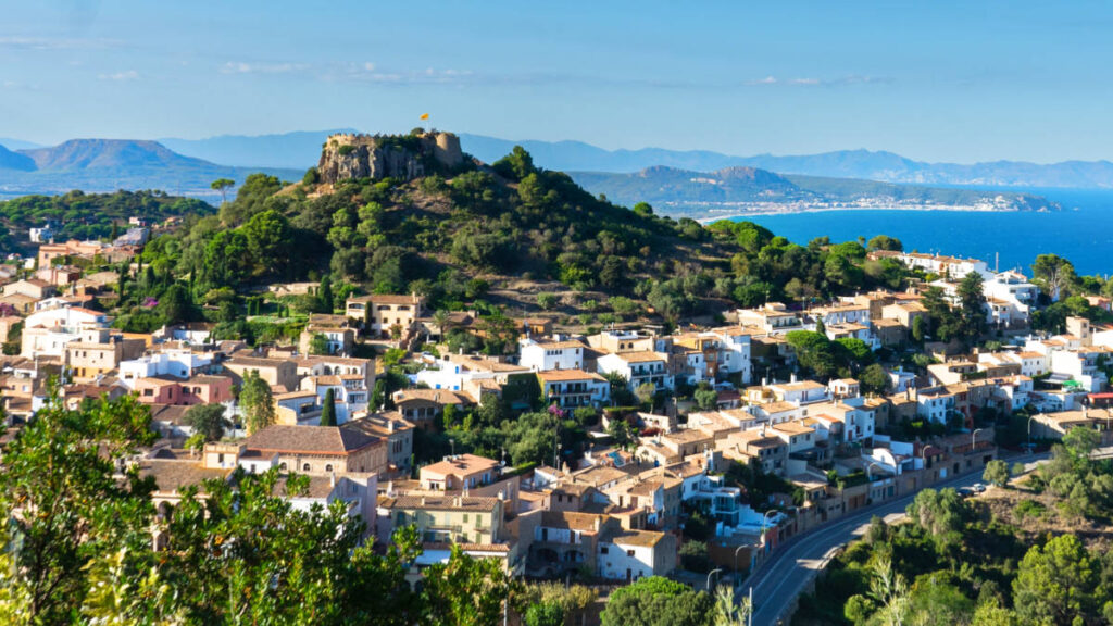 Aerial view of the beautiful village of Begur next to the Medes islands