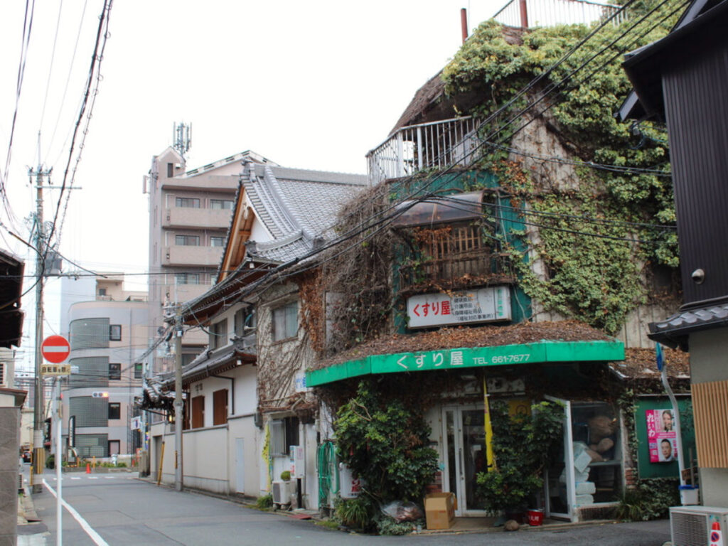 Streets of Kyoto with a vine-covered building seen