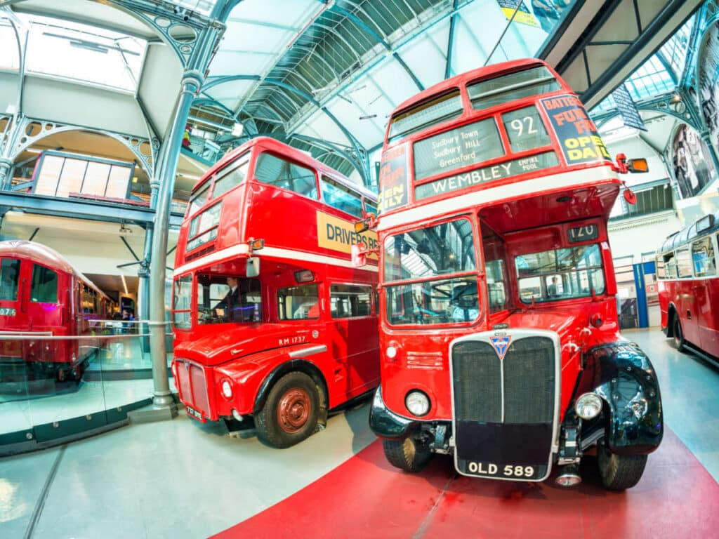 View of the vibrant red vintage double-decker buses at the London Transport Museum