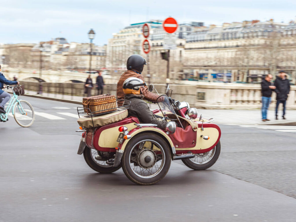A vintage sidecar riding around the city