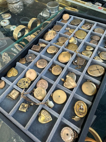 Vintage lockets on display at Randolph Street Market