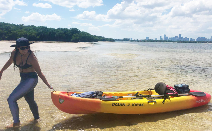 The author's wife pulling their kayak in Virginia Key