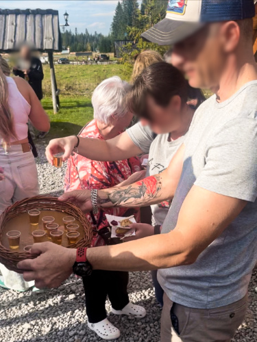 A man serving vodka samples