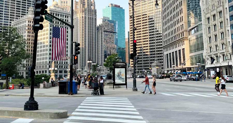 People crossing the pedestrian lanes in Chicago