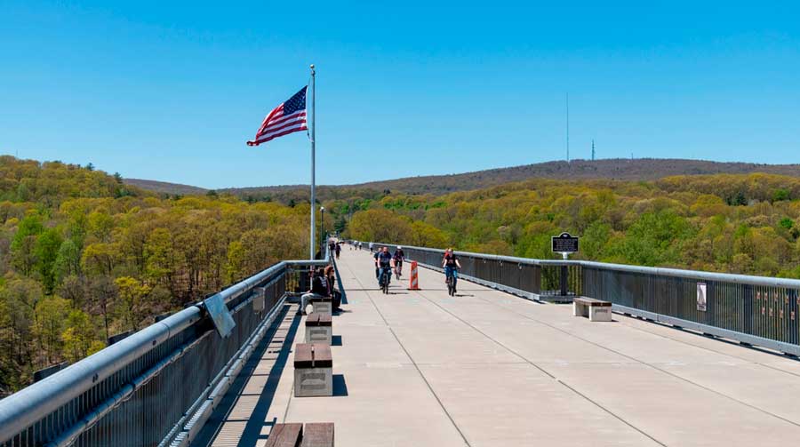 View of cyclist in Walkway Over the Hudson State Historic Park Bridge