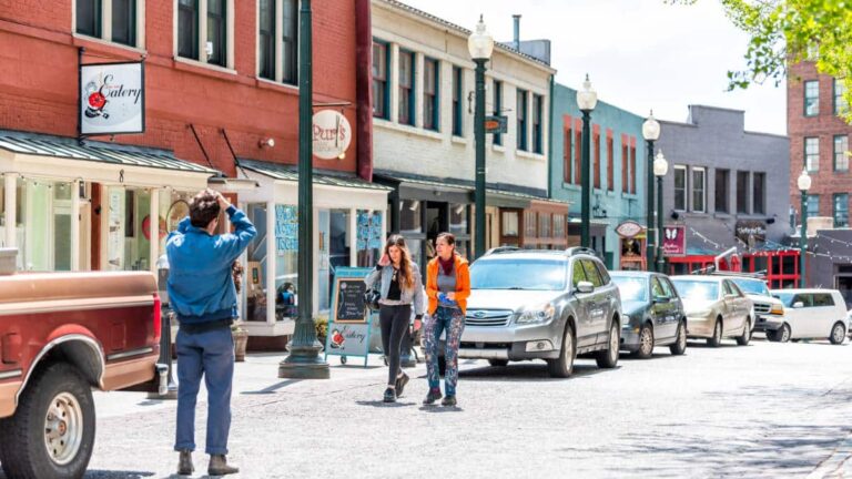 People wandering in Wall Street in Downtown Asheville