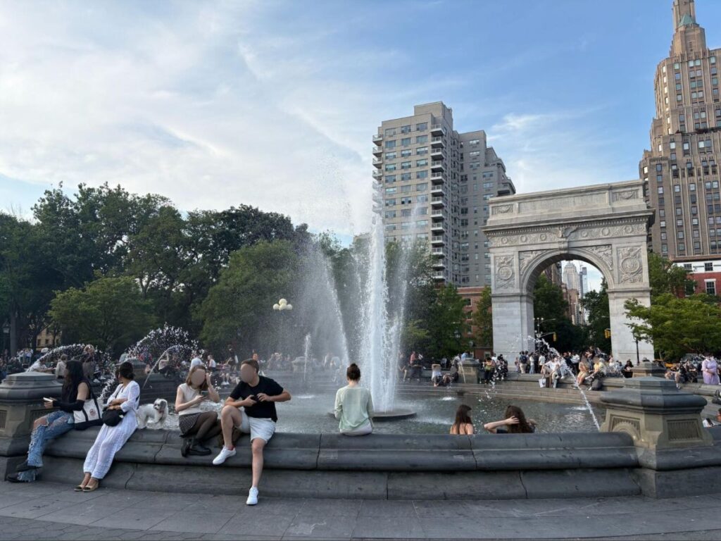 People chilling at Washington Square Park