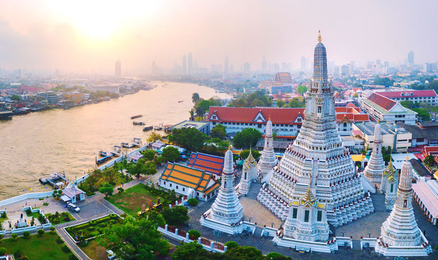 Overlooking view of the Wat Arun against the Bangkok skyline