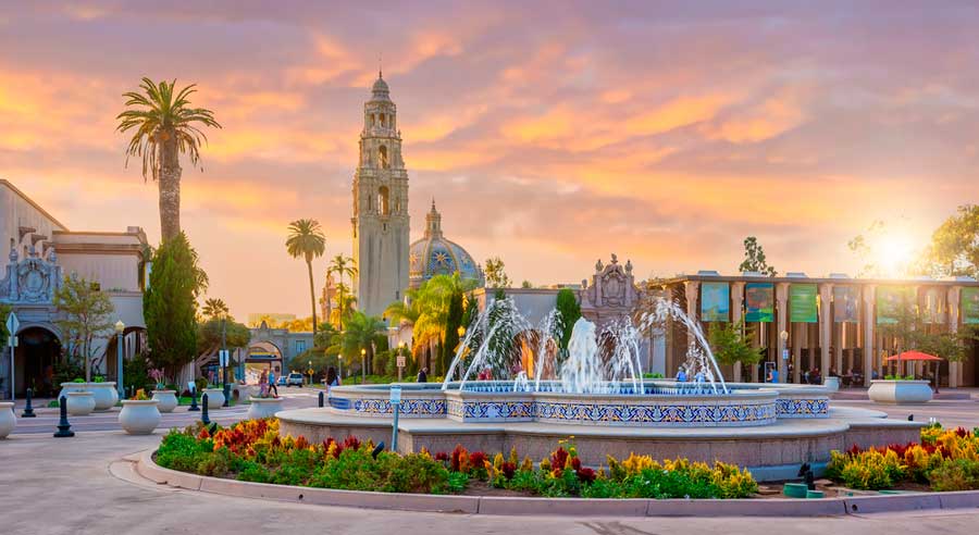Colorful sunset over a water fountain in Balboa Park