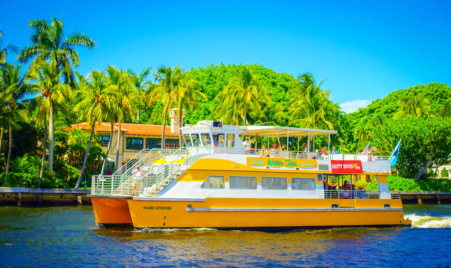 View of the yellow Water Taxi and the clear blue sky