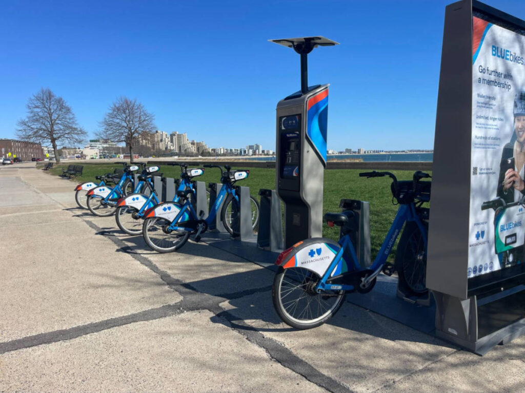 A waterfront view from the Blue Bikes Station