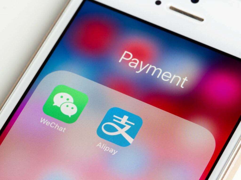 A phone with the WeChat and Alipay Apps