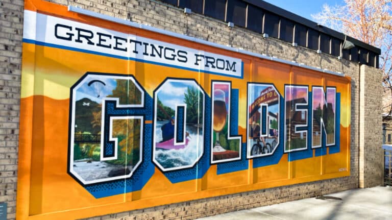 A mural of the welcome signage of Golden