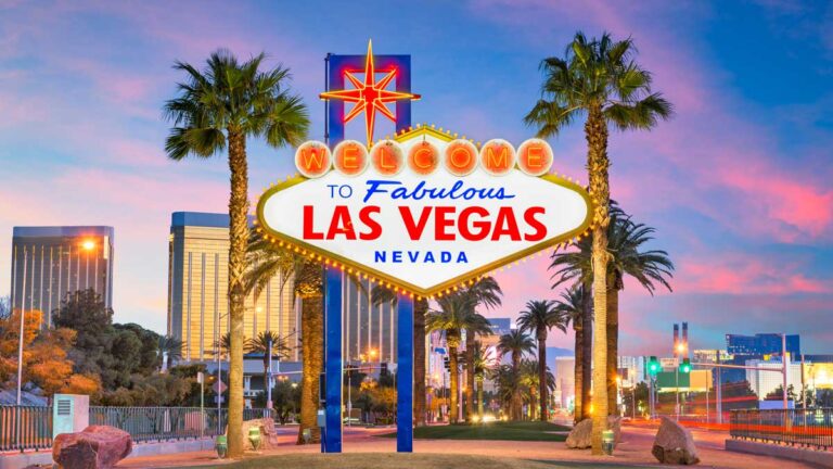 The Welcome to Fabulous Las Vegas Sign under the colorful sky in Las Vegas