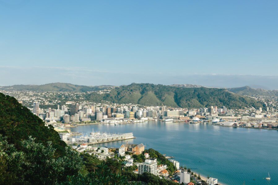 Aerial view of the city skyline and the mountains around