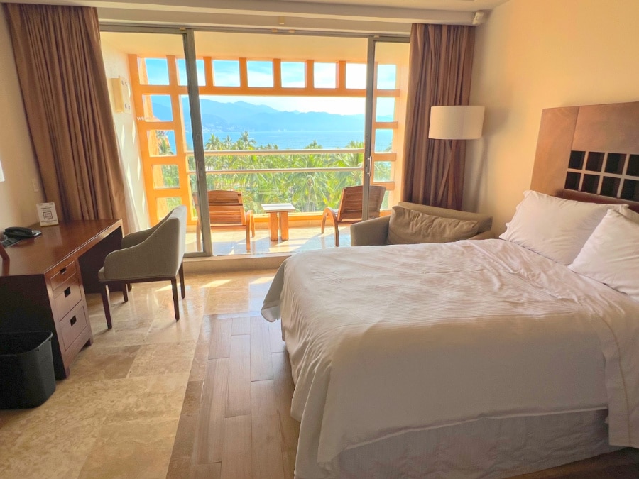 View of the bedroom in Westin Puerto Vallarta with the view from the balcony