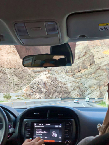 View of the white rocks from the car driving along the road