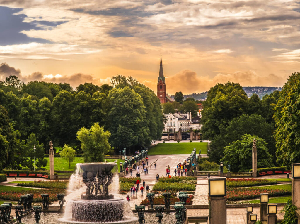 View from the hill of Vigeland Sculpture Park at the city of Oslo at sunset