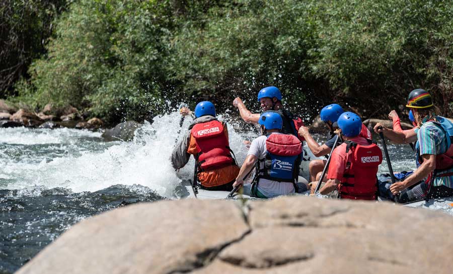 People enjoying whitewater rafting in Colorado Spings
