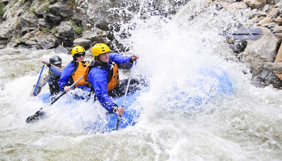People enjoying whitewater rafting in Telluride