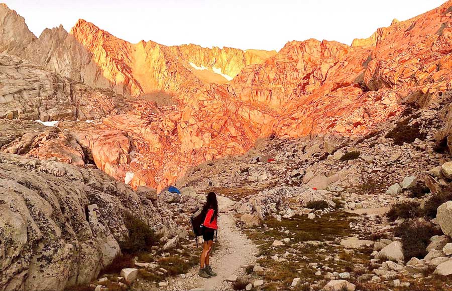 The author admiring the sunrise in Whitney trail