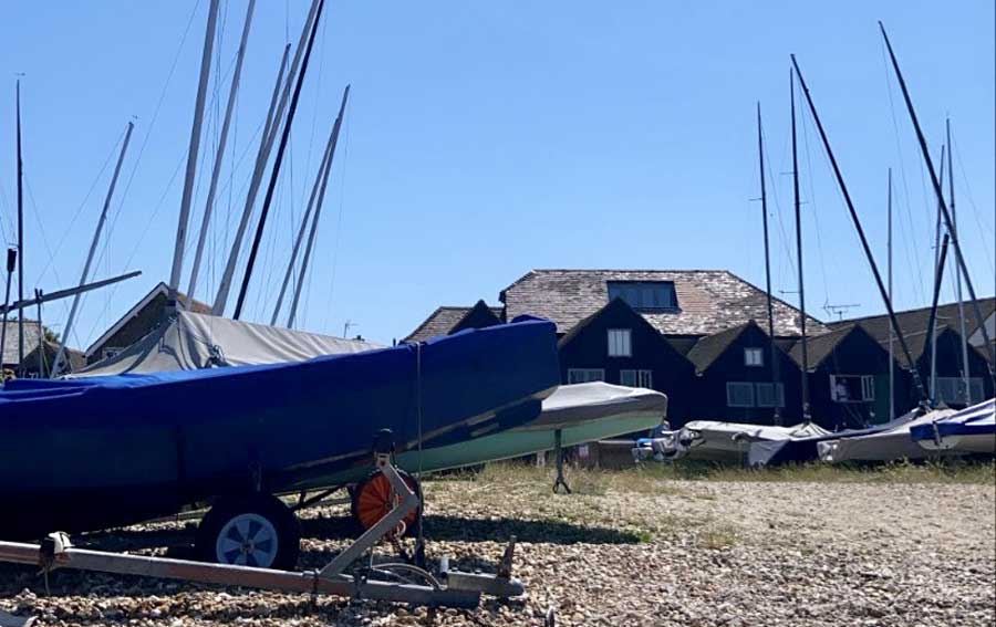 Boats parked in the land of Whitstable