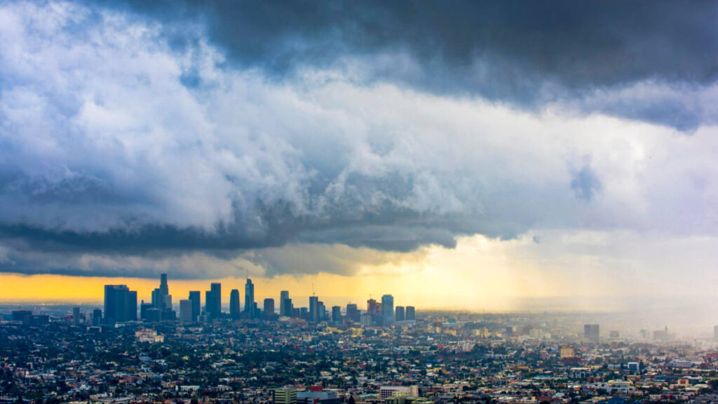 A storm raging over Los Angeles at sunset