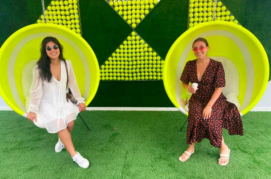 The author with her friend posing for a photo in Wimbledon