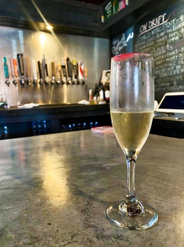 A glass of white wine at The Elephant in the Room