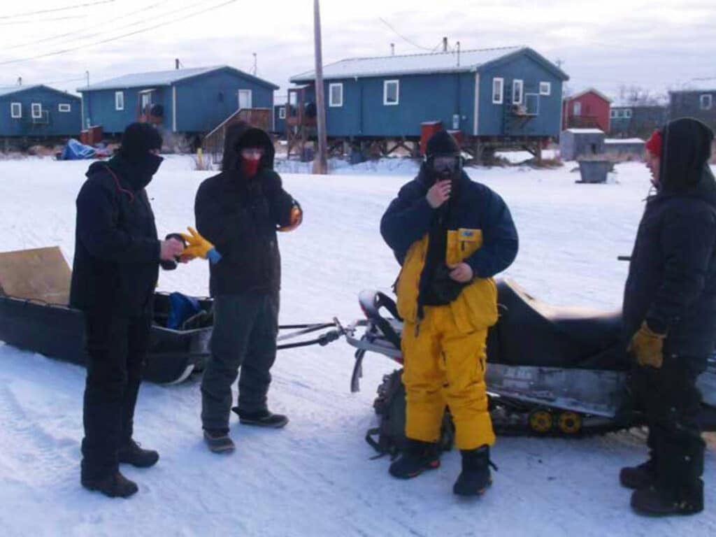 Men getting ready for their winter outing