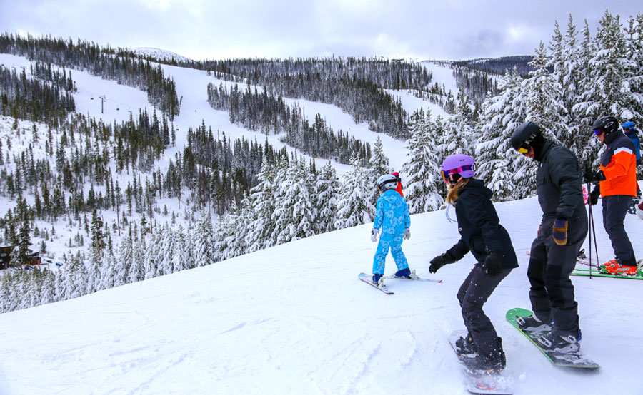 View of people skiing downhill at Winter Park Resort