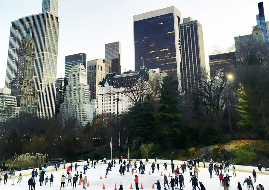 People enjoying ice skating in Wollman Rink