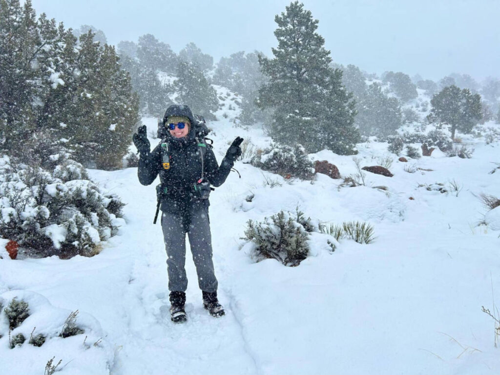 The author's best friend on a backpacking trip on a snowy day