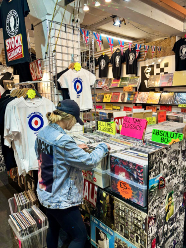 A woman browsing on the record selection at the Brick Lane Vintage Market 