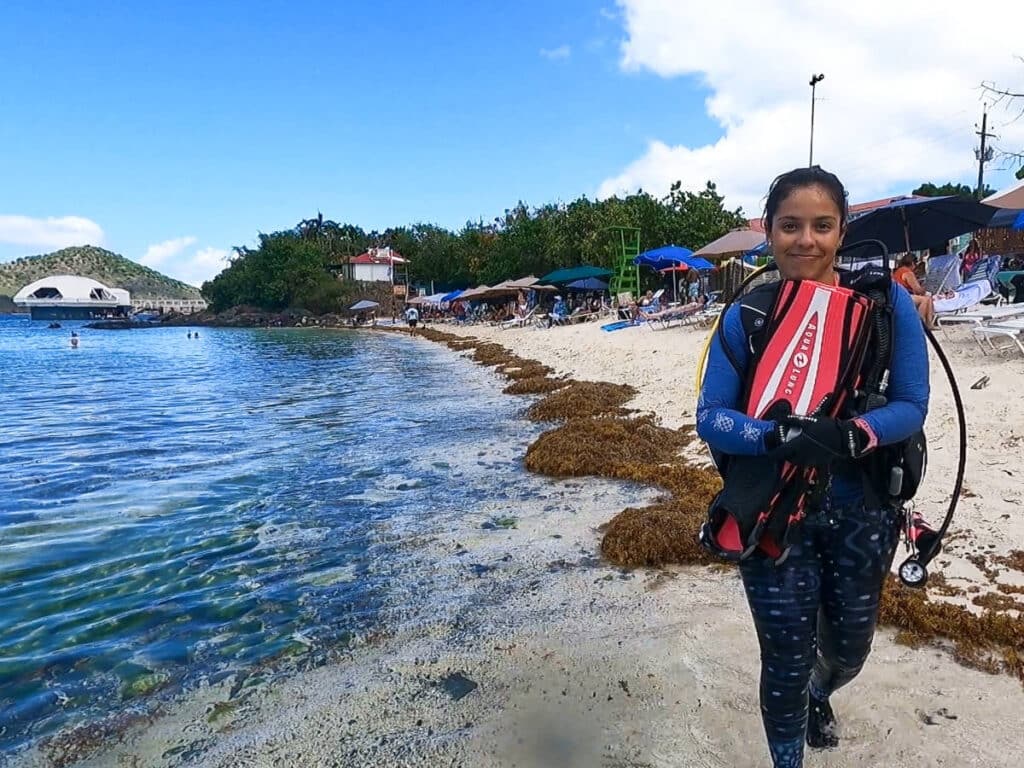 The author's wife wearing her diving suit in Coki Beach