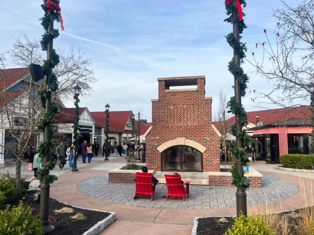 A huge brick fireplace in the middle of Woodbury Common Premium Outlets