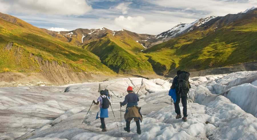 View of people during a trek in Wrangell-St. Elias National Park