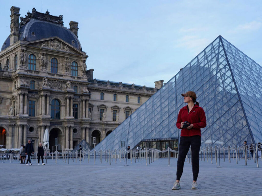 Writer Betty in front of the Louvre Museum pyramid