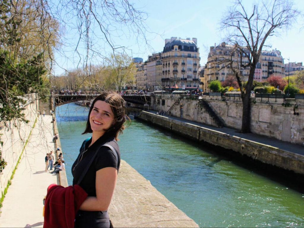 Writer Betty beside the Seine outside of Notre Dame