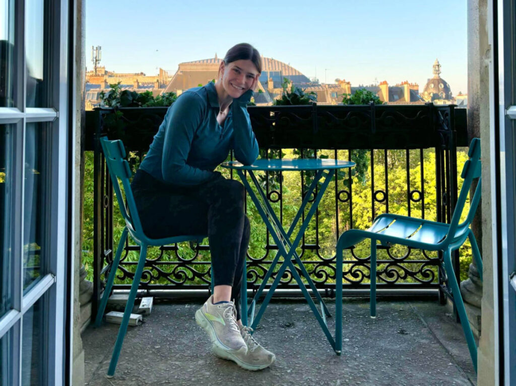Writer Betty sitting at the balcony in Le Marais