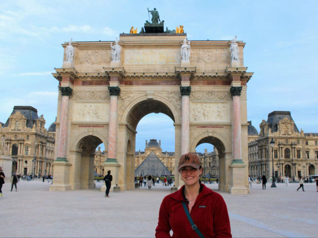Writer Betty by the Arc de Triomphe du Carrousel across from the Louvre Museum