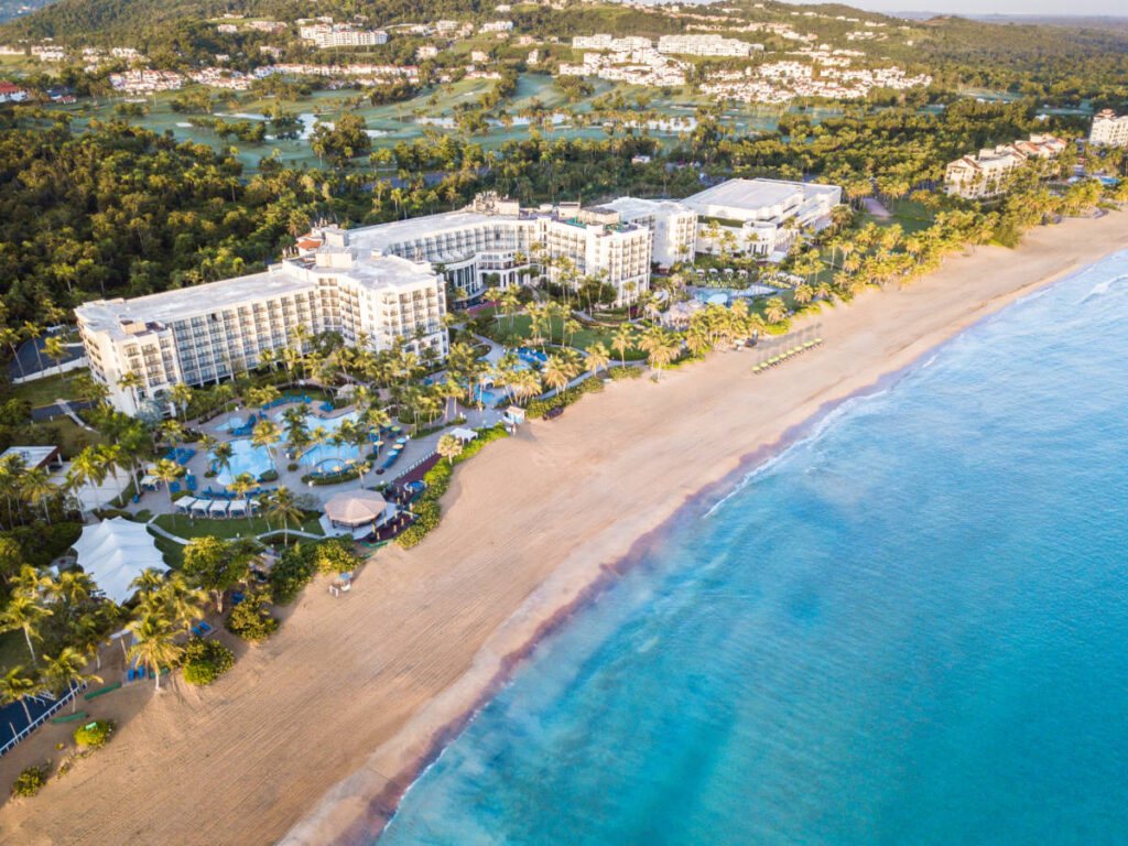 View of the beachfront and facade of Wyndham Grand Rio Mar Puerto Rico