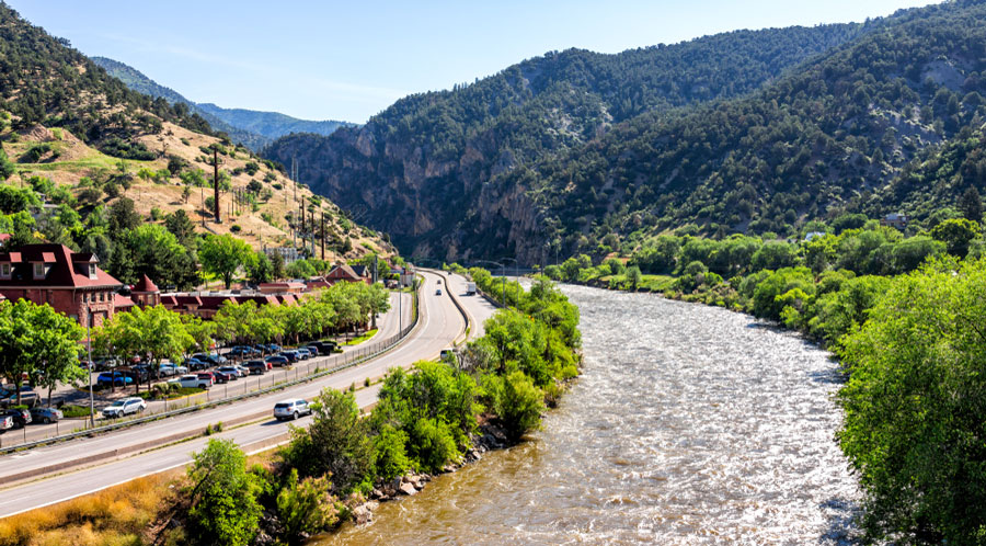 View of the Roaring Fork River beside a highway in Colorado